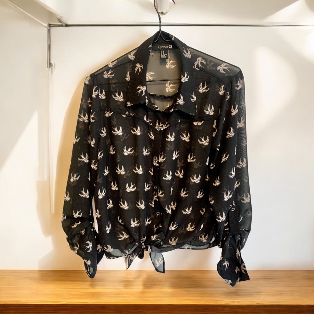 Woman’s Forever 21 sheer button up blouse with Swallow print